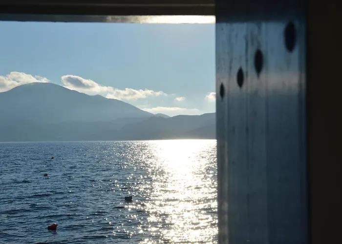 Captain's Boathouse, *